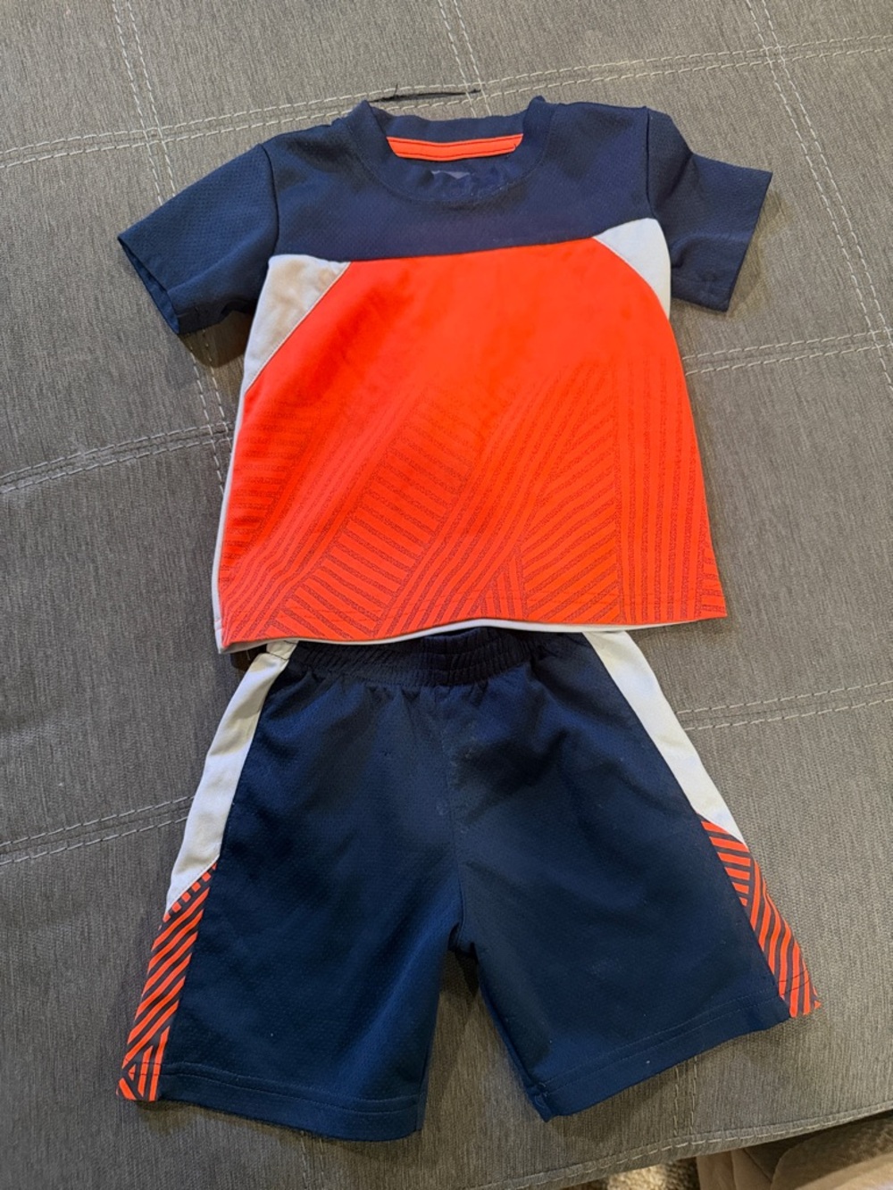 Nike Kids Two-Piece Set in Navy, Orange, and White